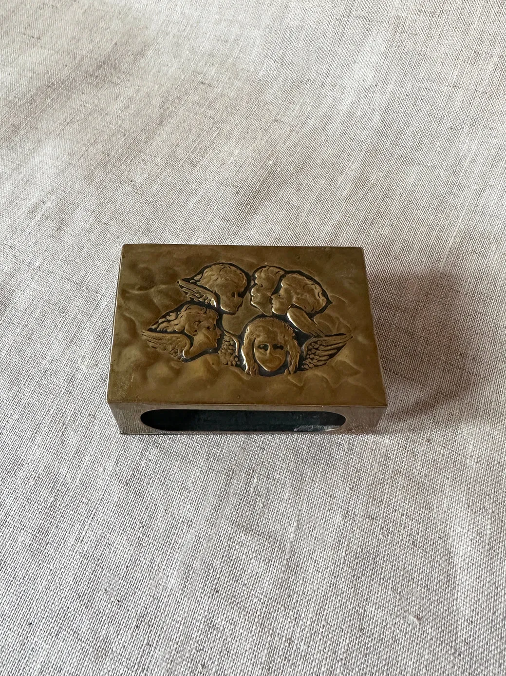 Antique brass repoussé matchbox holder
