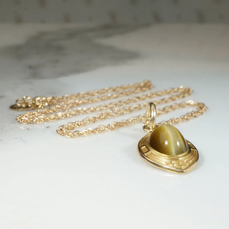 Buttery Tiger's Eye in Engraved Gold Arts & Crafts Pendant