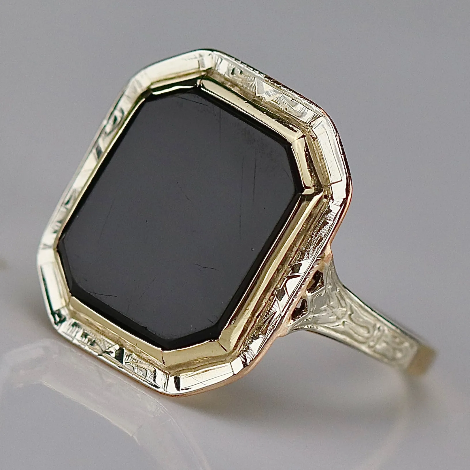 Edwardian onyx ring in yellow and white gold