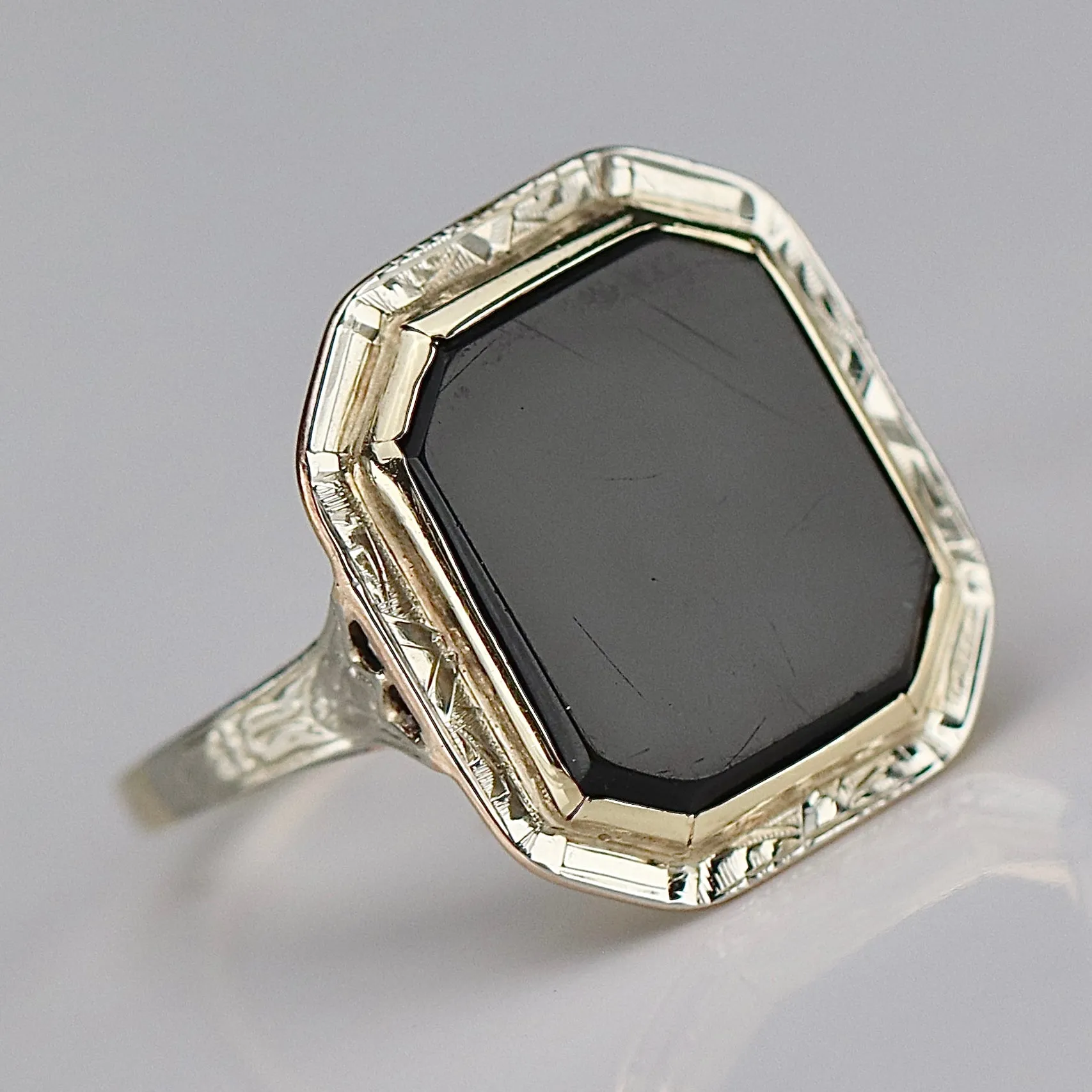 Edwardian onyx ring in yellow and white gold