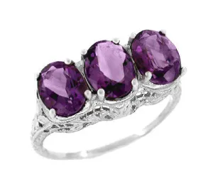 Edwardian Three Stone Oval Amethyst Filigree Ring in 14 Karat White Gold