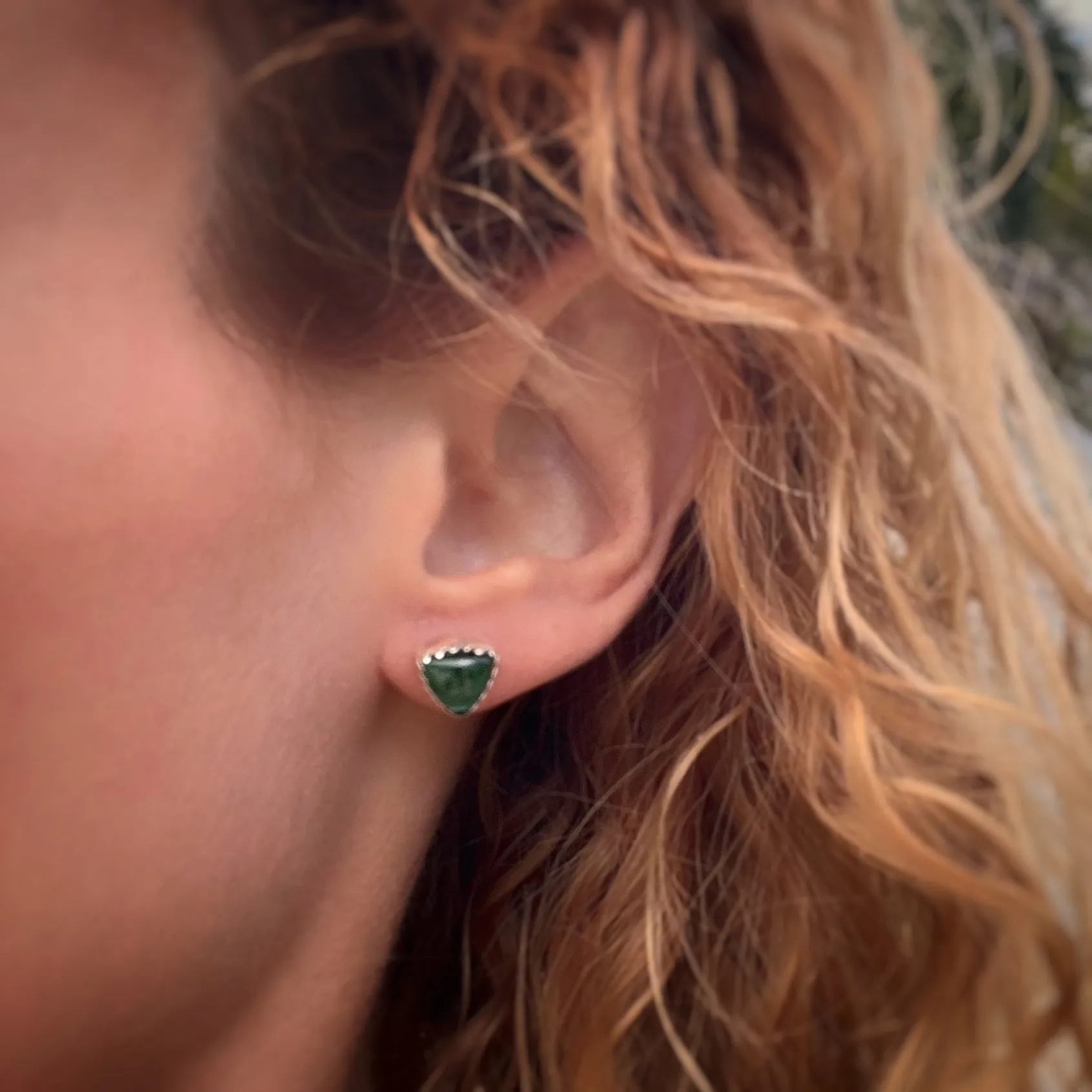 Green tourmaline triangle studs in silver