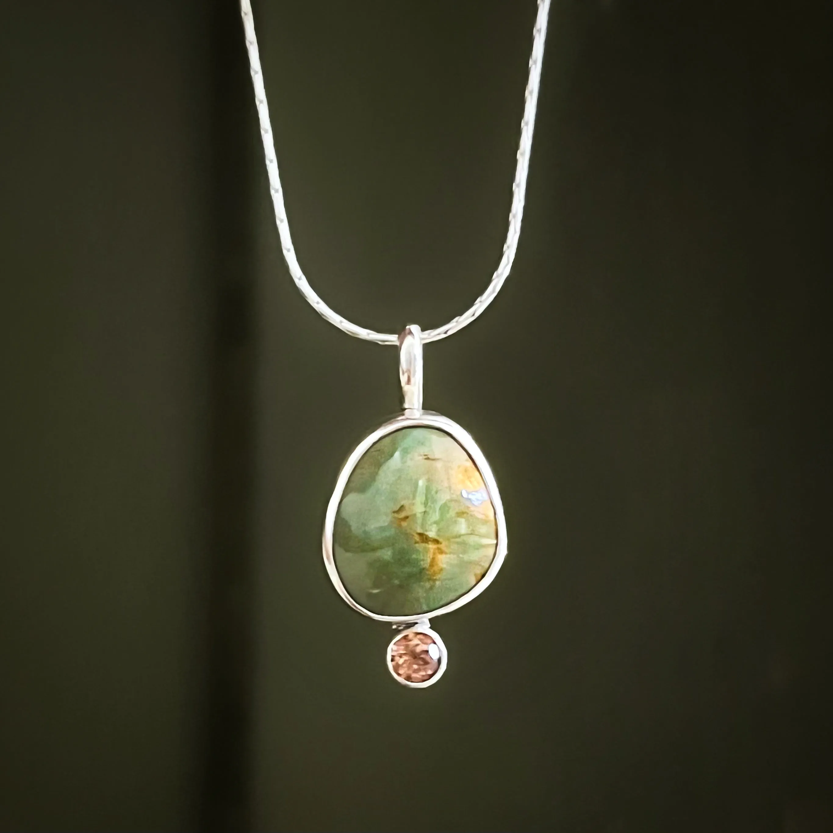 Green turquoise necklace with chocolate zircon