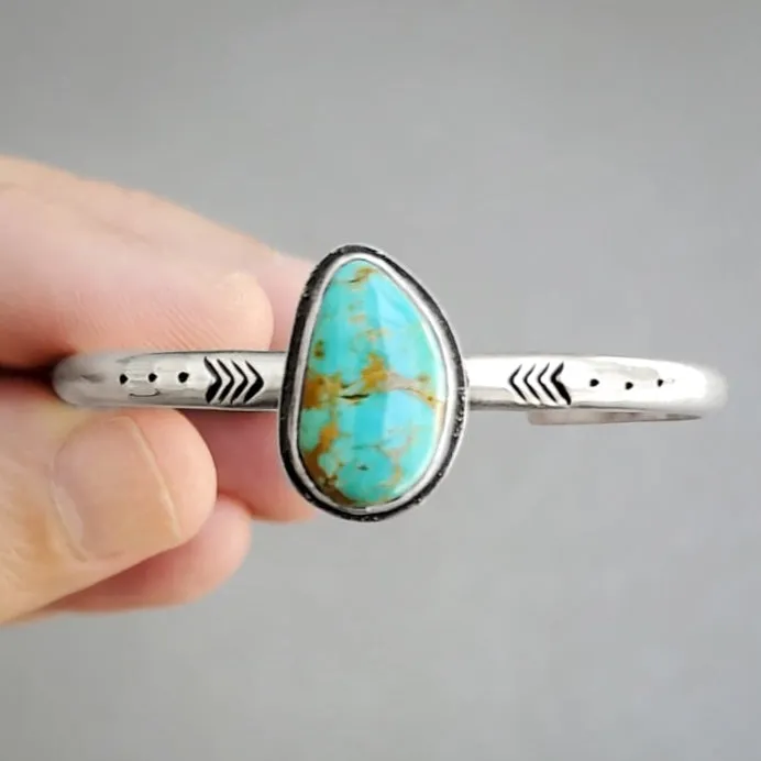 Hand-stamped turquoise cuff in silver