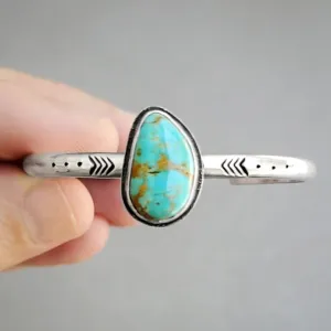 Hand-stamped turquoise cuff in silver