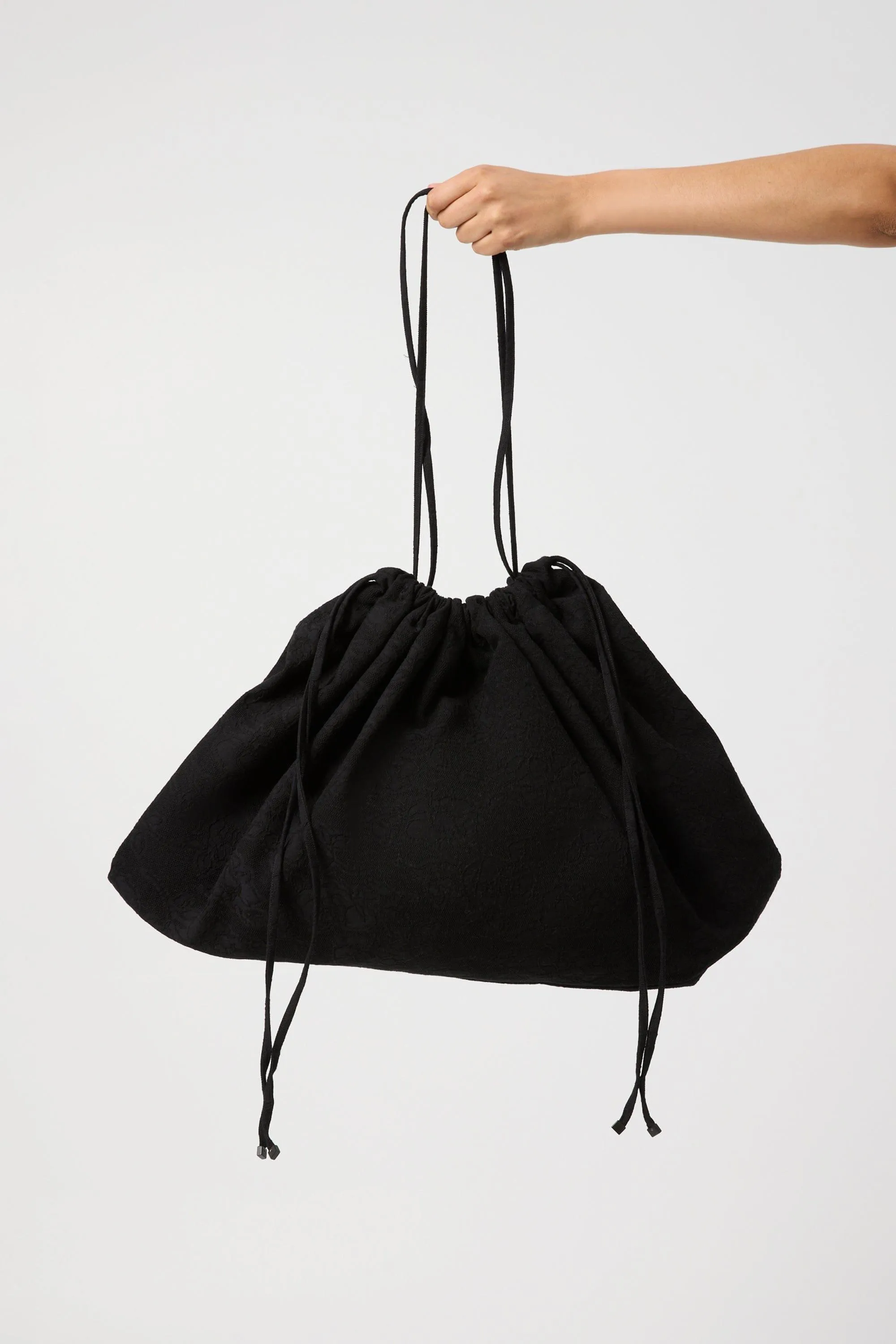 INNATE DRAWN IN BAG | BLACK