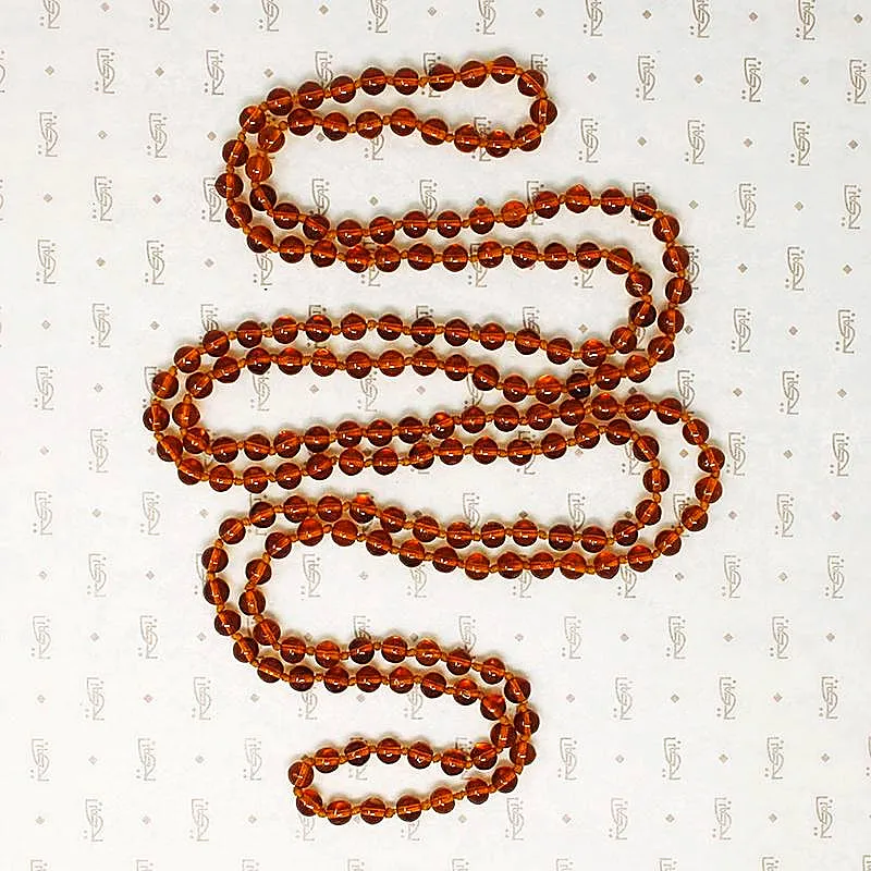 Long Strand of English Moulded Glass Beads