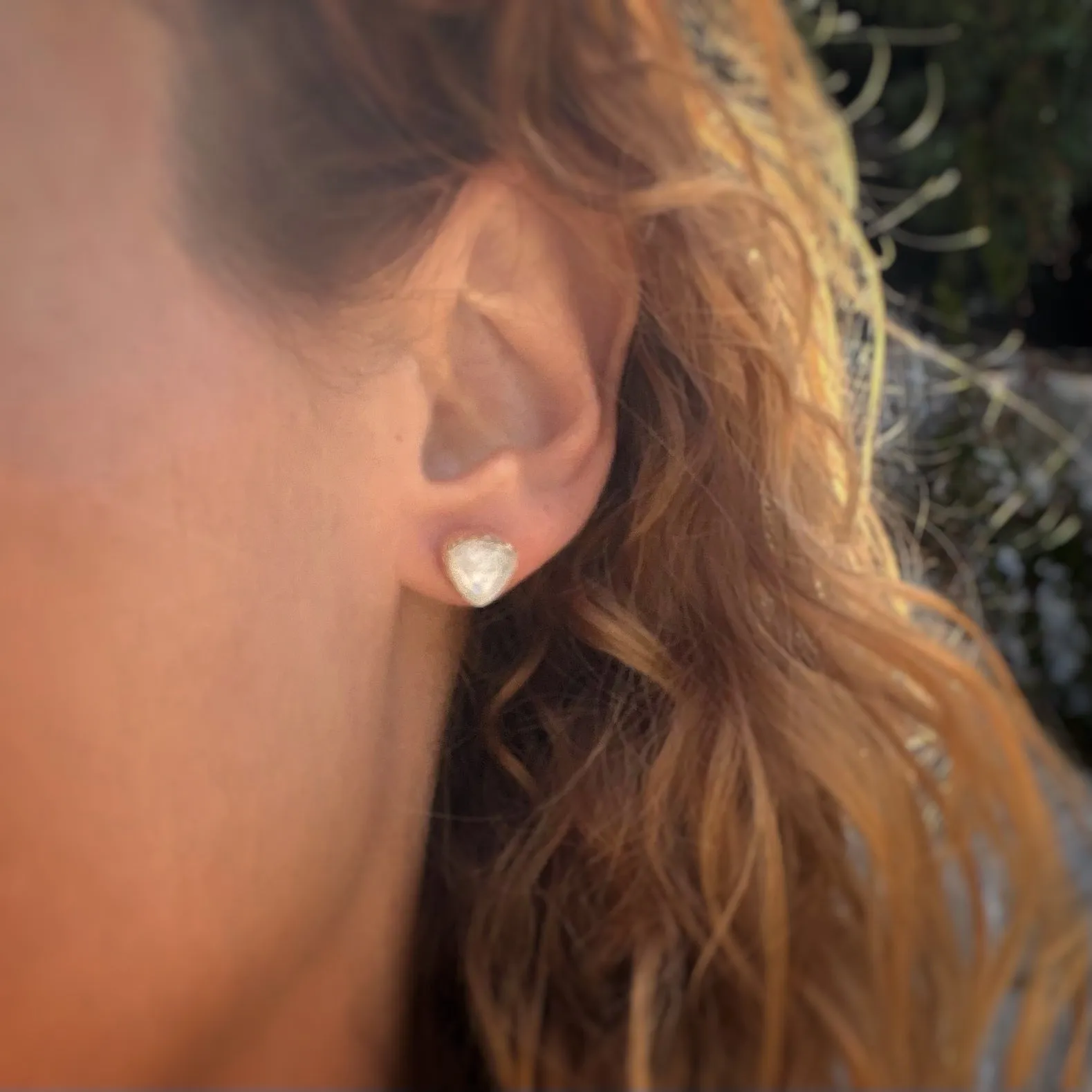 Moonstone triangle studs in silver