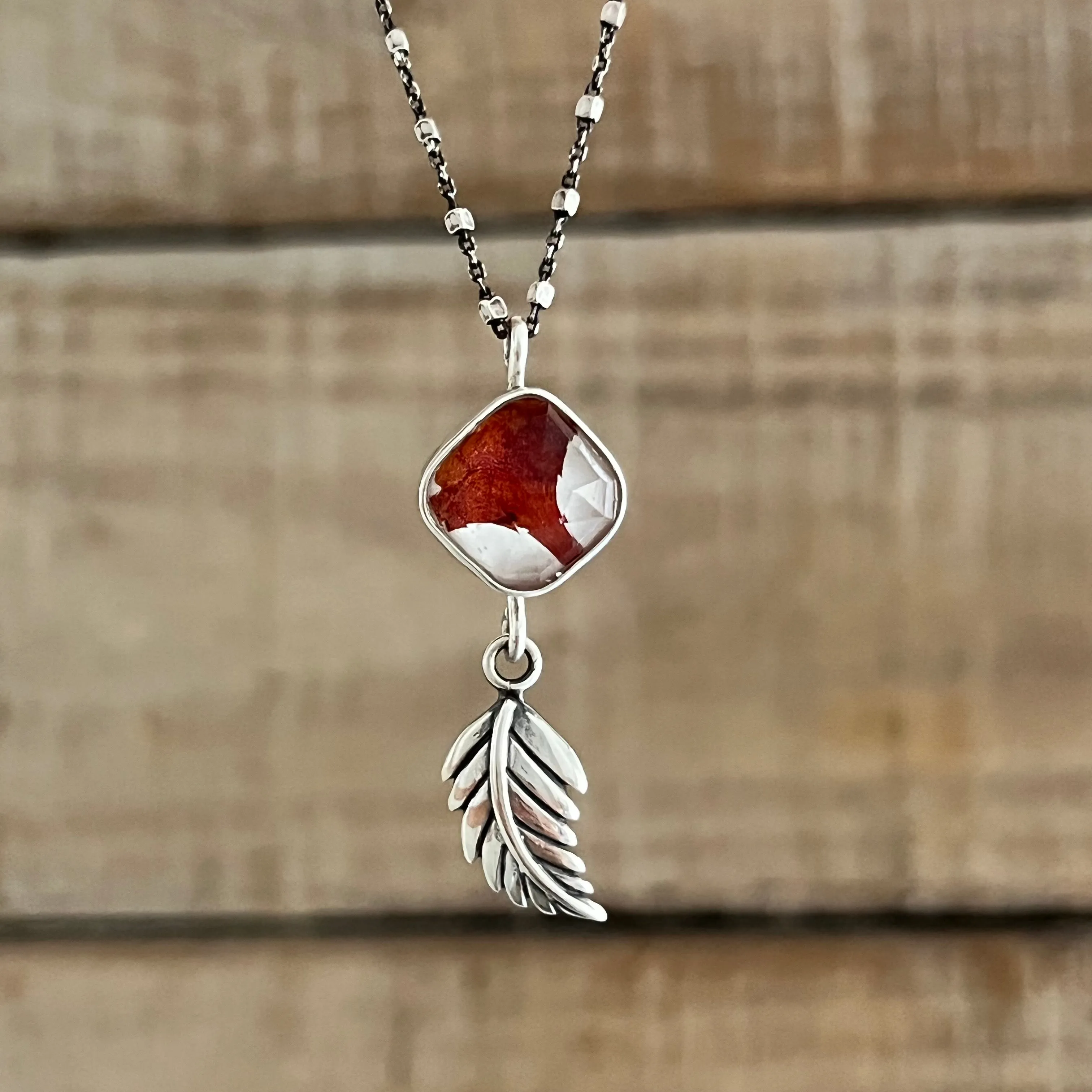 Red flower terrarium necklace with leaf dangle