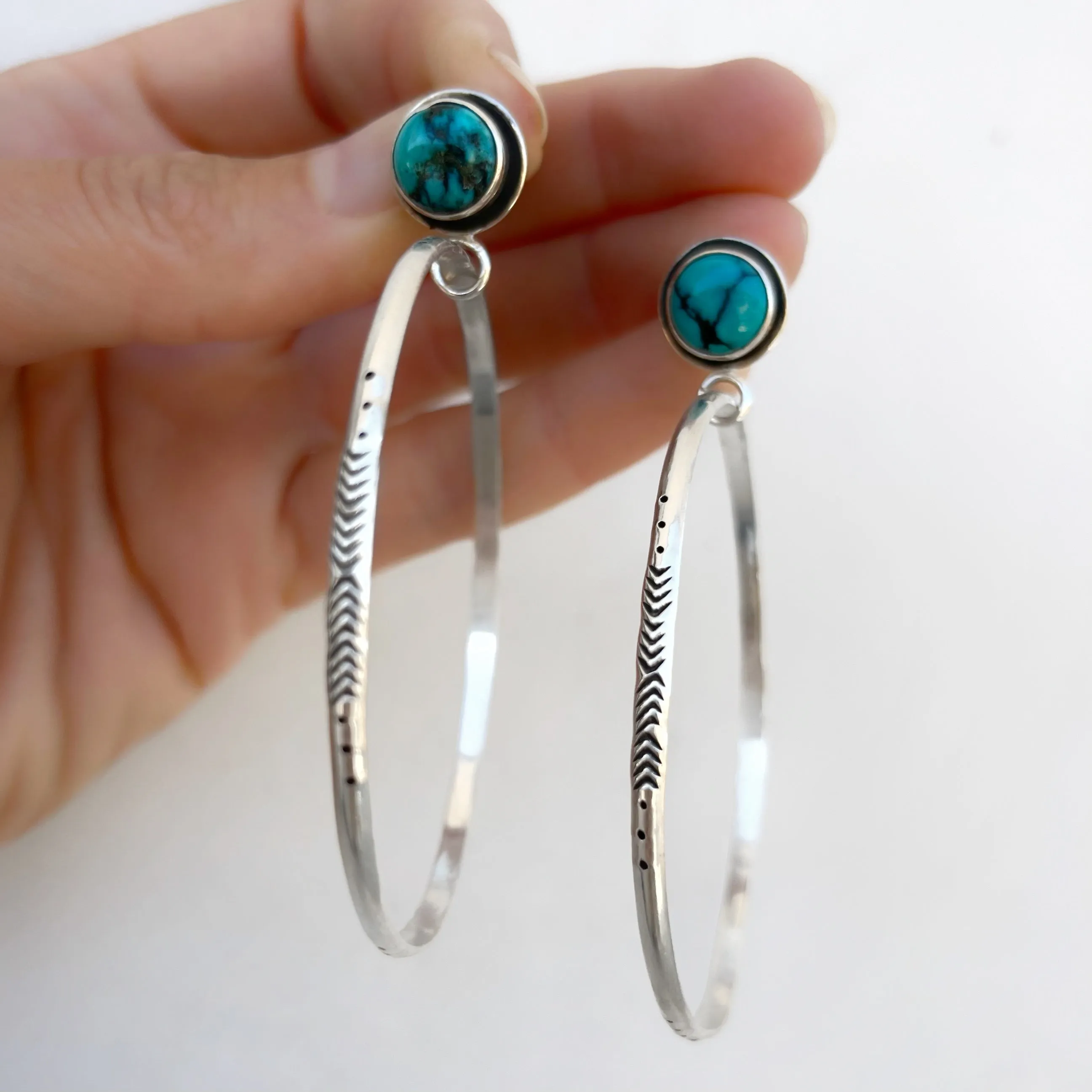 Small turquoise studs in silver