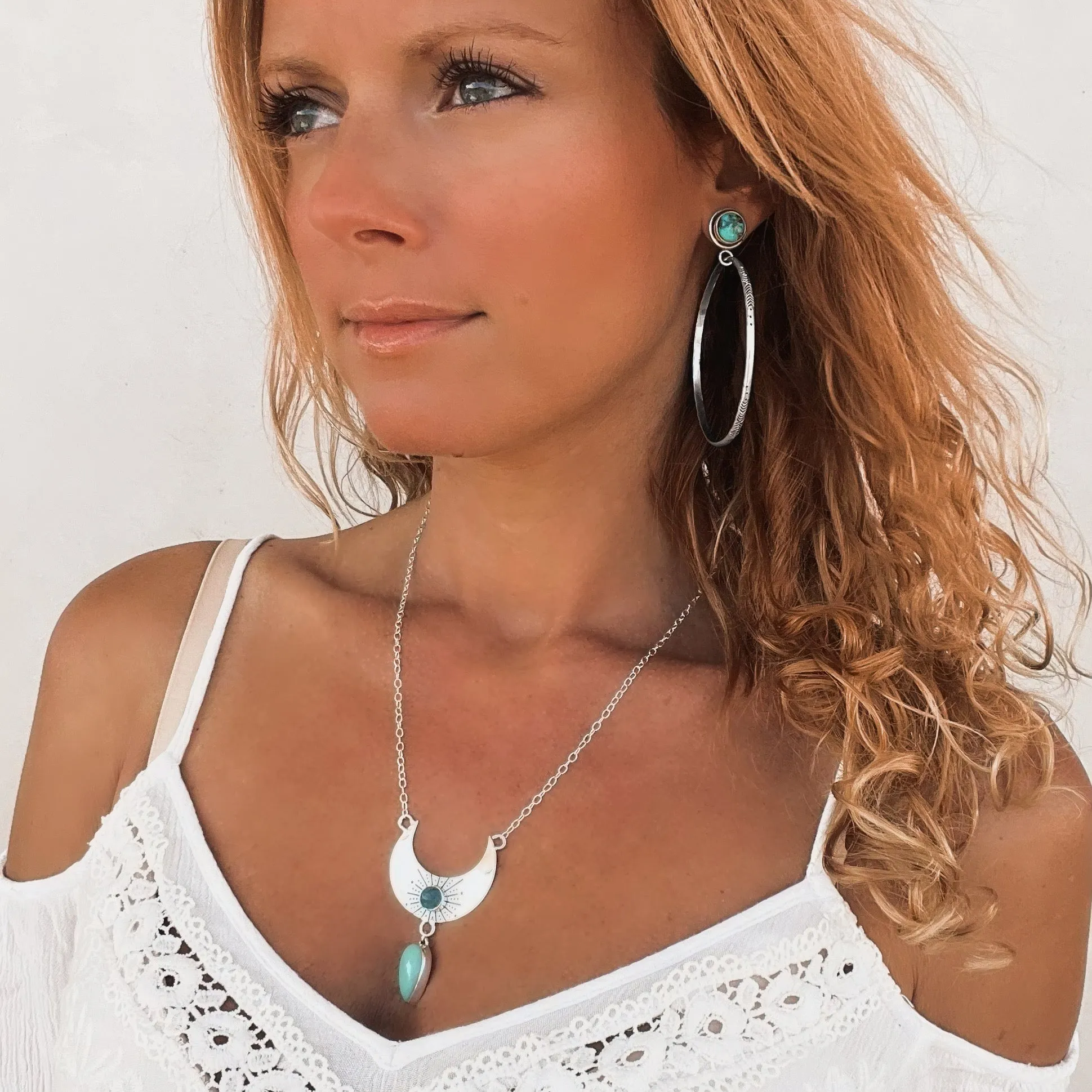 Small turquoise studs in silver