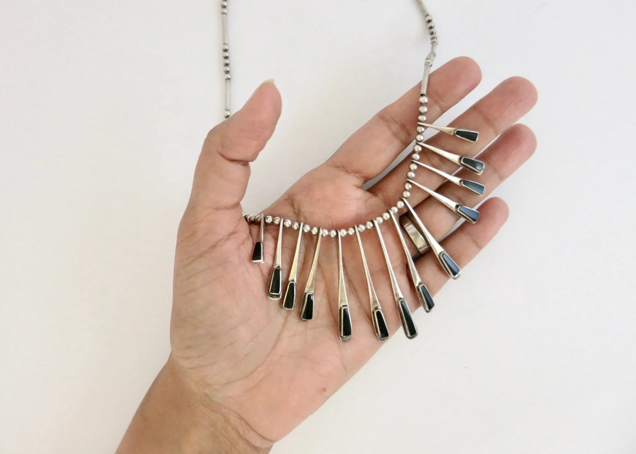 Sophisticated, onyx inlaid, modernist drape necklace from Mexico