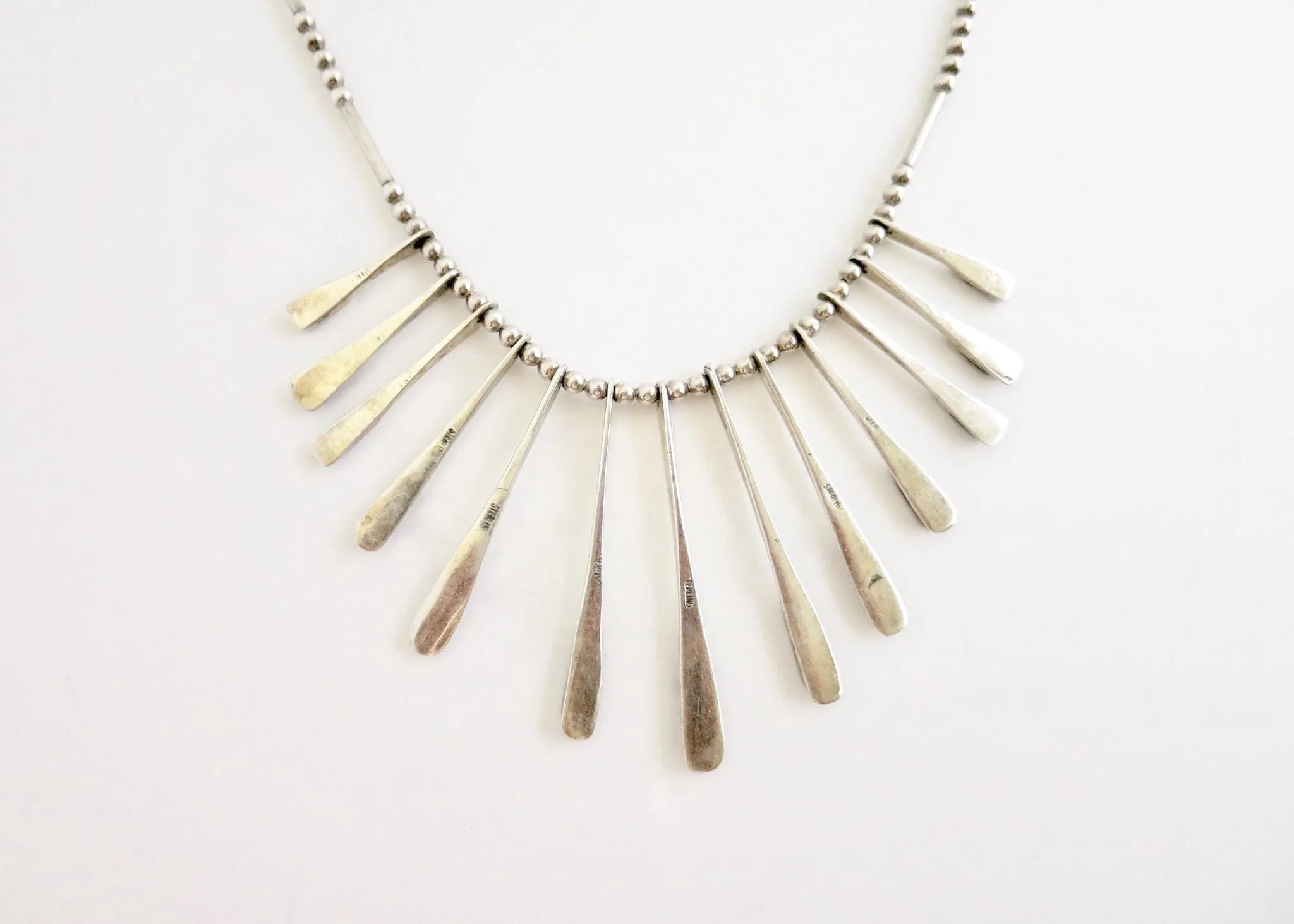 Sophisticated, onyx inlaid, modernist drape necklace from Mexico