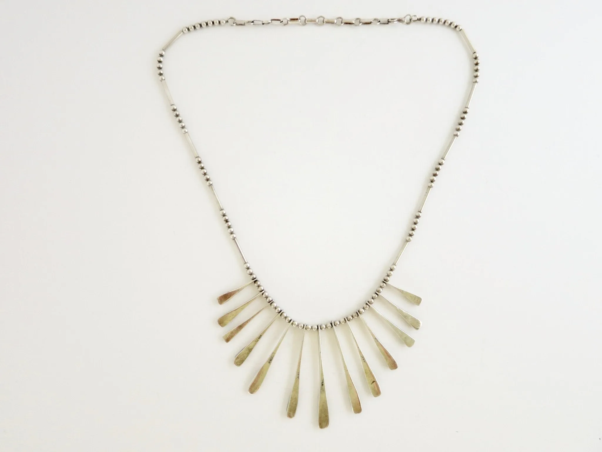 Sophisticated, onyx inlaid, modernist drape necklace from Mexico