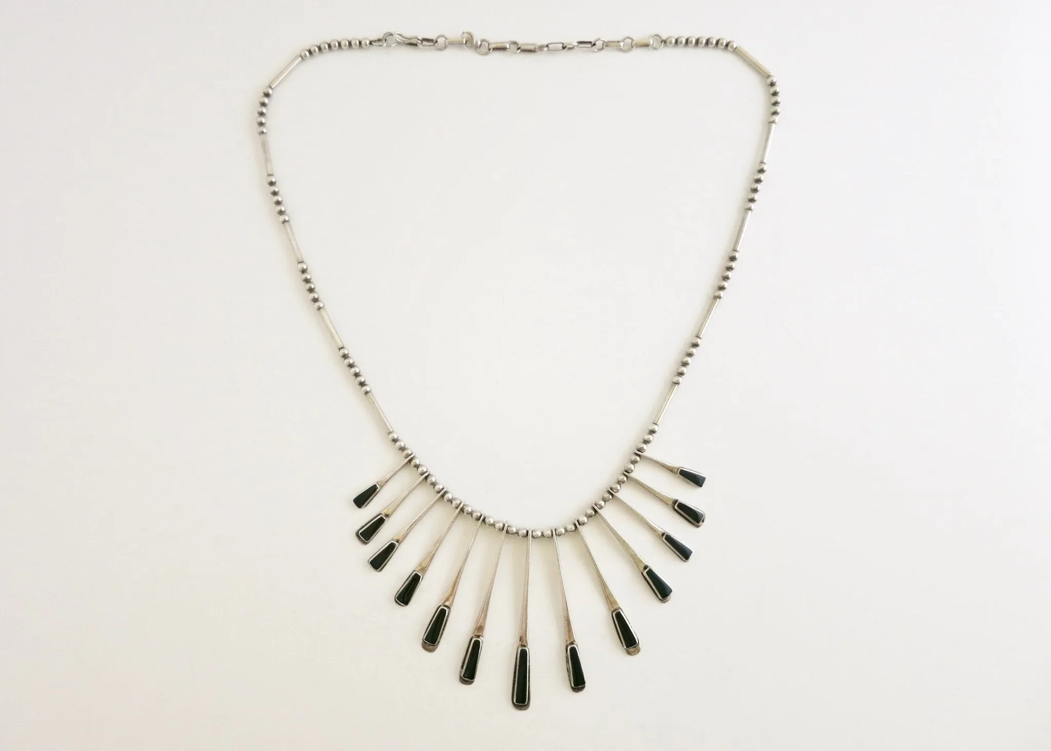 Sophisticated, onyx inlaid, modernist drape necklace from Mexico