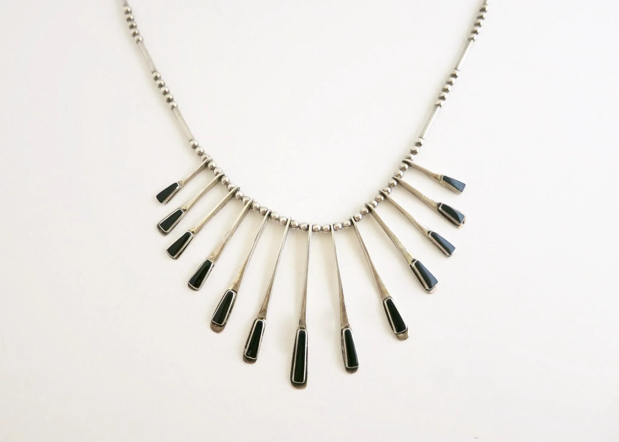 Sophisticated, onyx inlaid, modernist drape necklace from Mexico