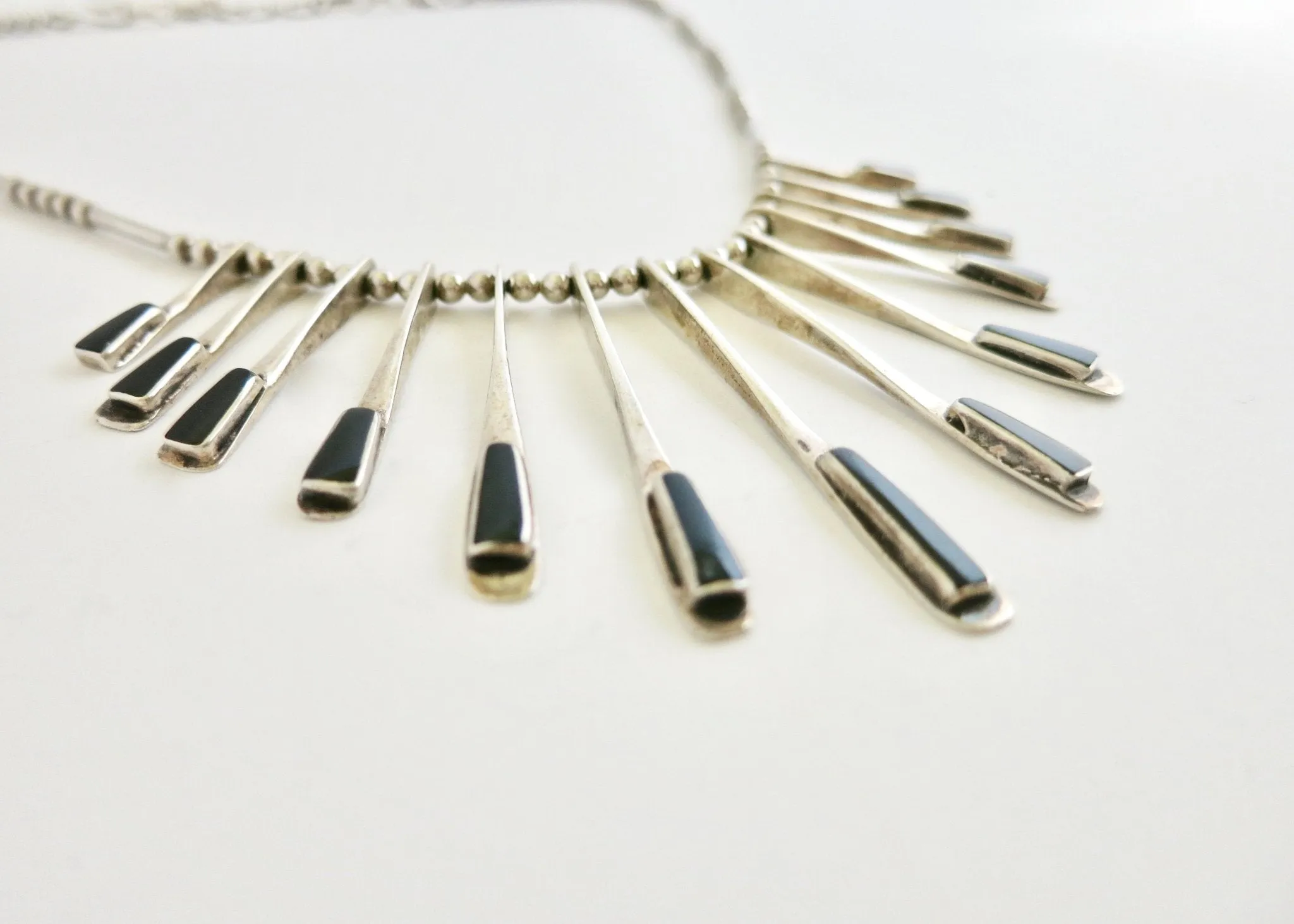 Sophisticated, onyx inlaid, modernist drape necklace from Mexico
