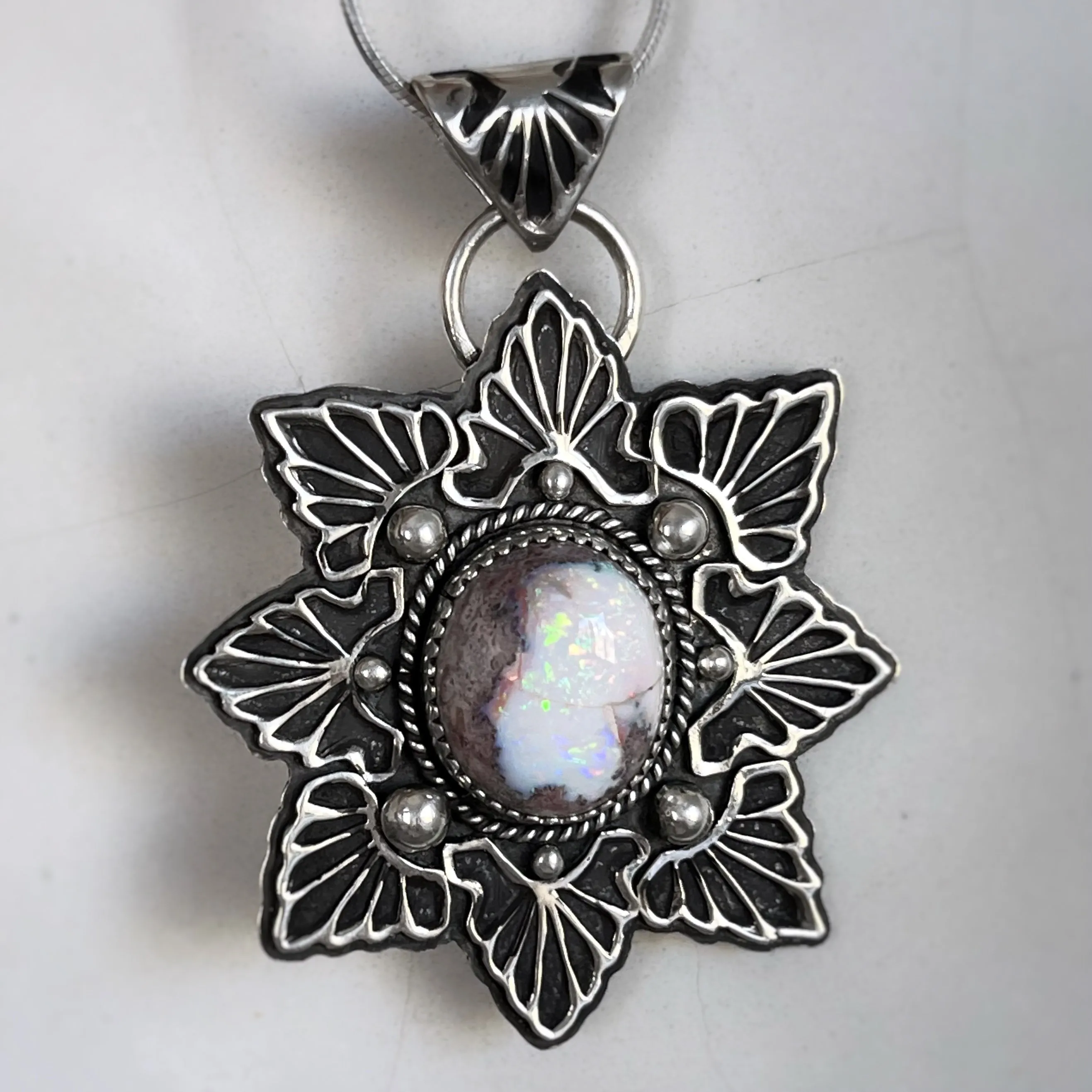 Stamped star necklace with hydrophane opal