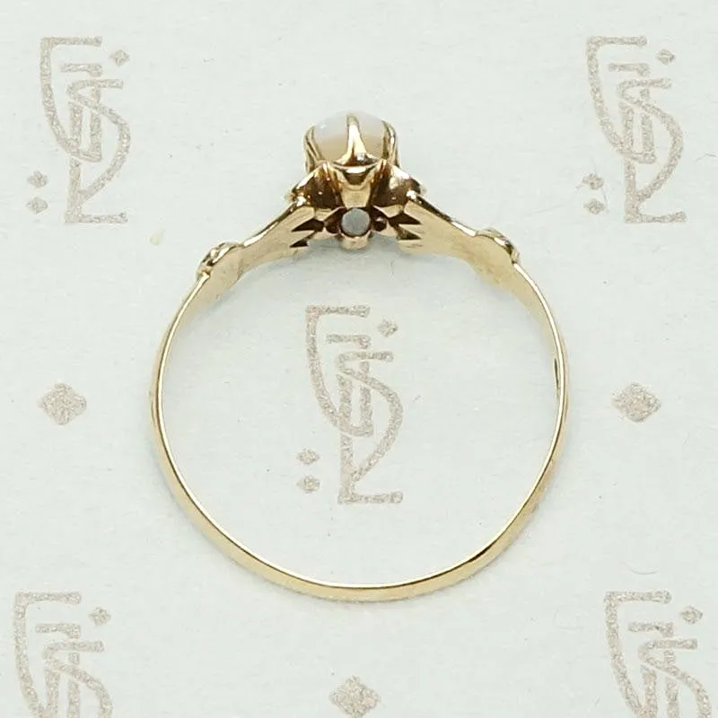 Tulip Set Opal Solitaire Ring