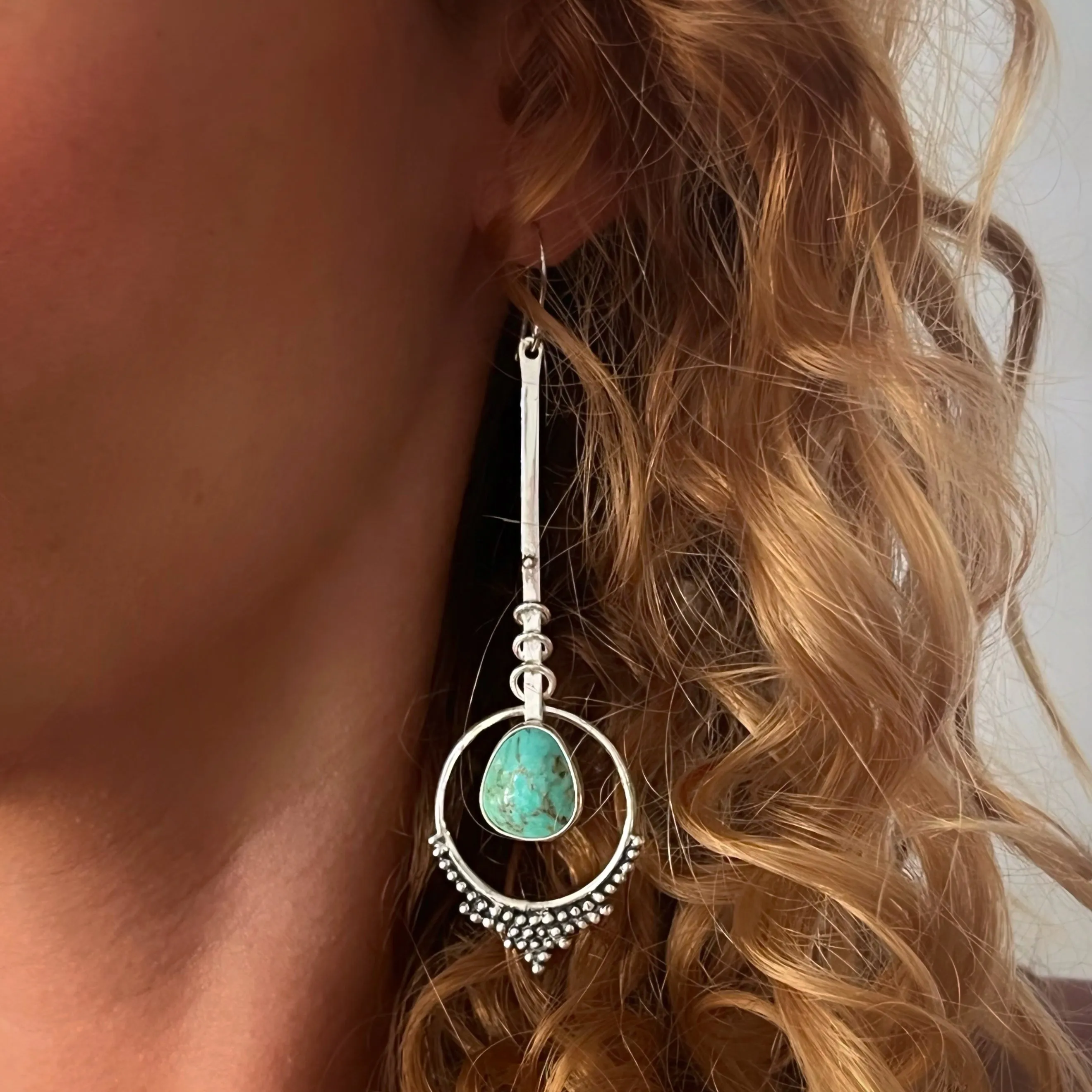 Turquoise pendulum earrings in silver