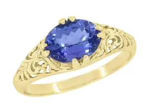 Yellow Gold Edwardian Fleur-De-Lys Filigree East to West Oval Tanzanite Ring