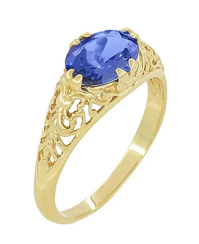 Yellow Gold Edwardian Fleur-De-Lys Filigree East to West Oval Tanzanite Ring