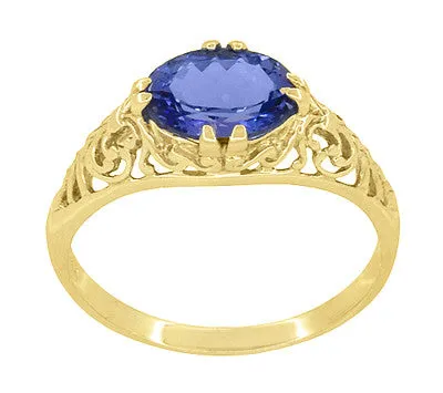 Yellow Gold Edwardian Fleur-De-Lys Filigree East to West Oval Tanzanite Ring